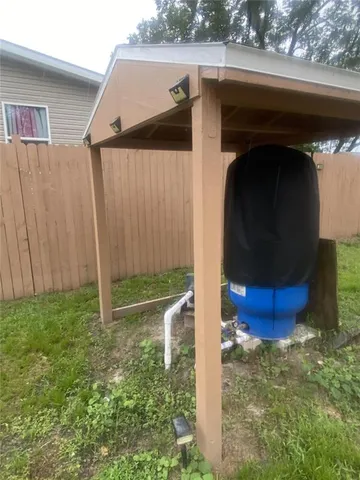 a bedroom with furniture and window