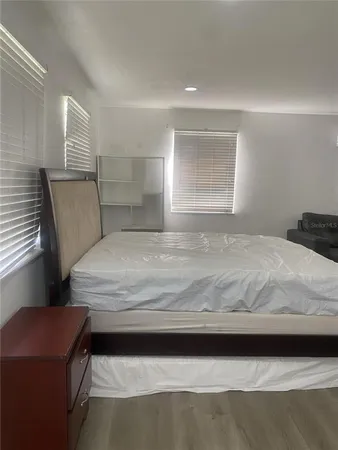 a lobby with furniture and a table