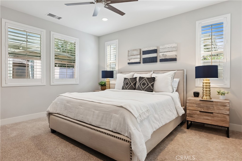 27 Alienta Lane Rancho Mission Viejo, CA 92694 - Photo 13 of 75 a bedroom with a bed a flat tv screen and a dresser