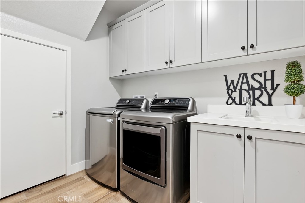 27 Alienta Lane Rancho Mission Viejo, CA 92694 - Photo 34 of 75 a kitchen with a stove and a microwave
