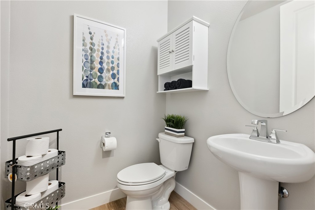 27 Alienta Lane Rancho Mission Viejo, CA 92694 - Photo 35 of 75 a bathroom with a toilet sink and mirror