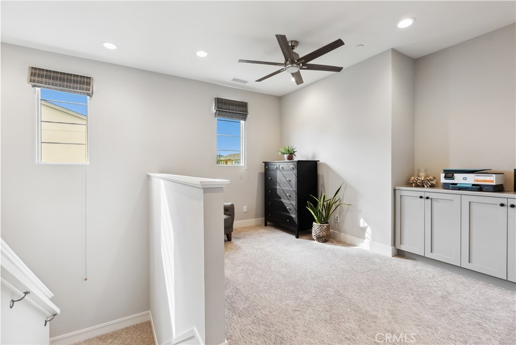 27 Alienta Lane Rancho Mission Viejo, CA 92694 - Photo 37 of 75 a view of a livingroom with a kitchen