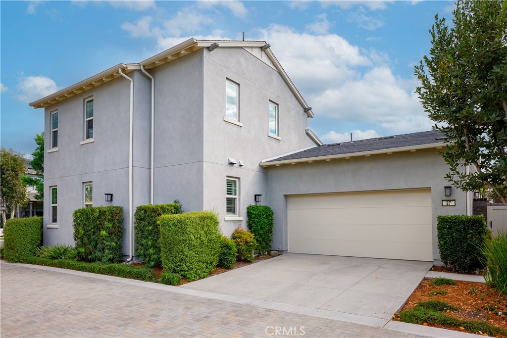 27 Alienta Lane Rancho Mission Viejo, CA 92694 - Photo 42 of 75 a front view of a house with a garden