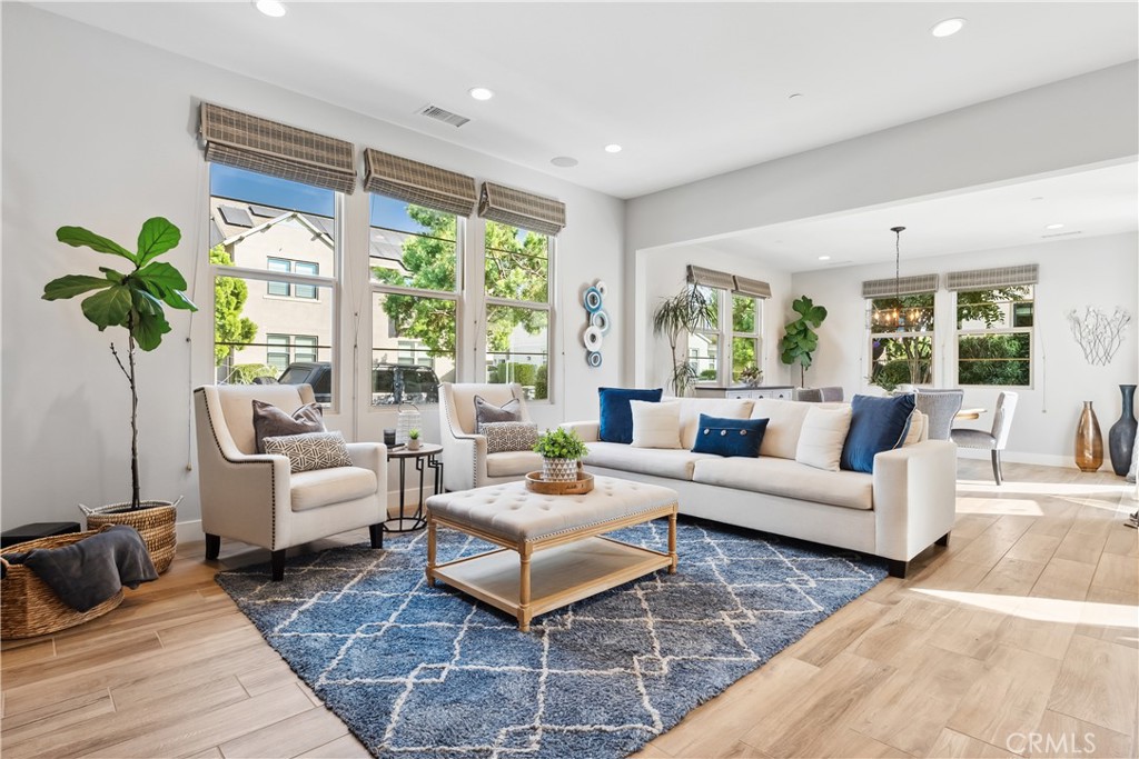 27 Alienta Lane Rancho Mission Viejo, CA 92694 - Photo 9 of 75 a living room with furniture potted plant and a large window