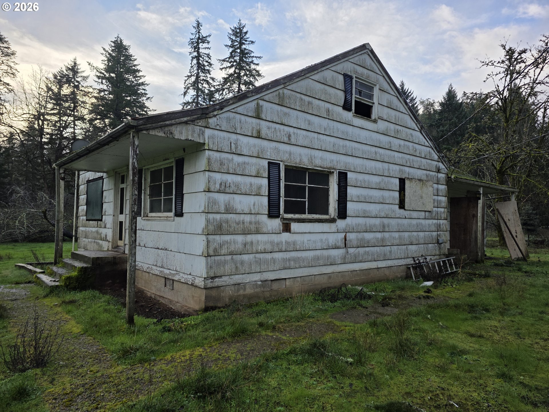 3890 Mill Creek Road Dallas, OR 97338 - Photo 21 of 36 a view of a house with a yard