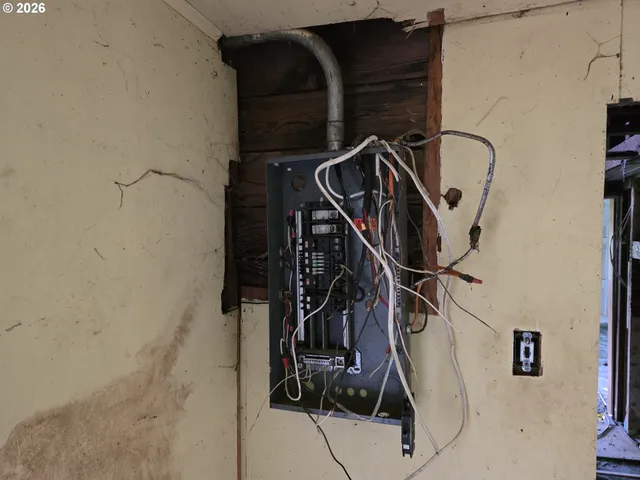a view of storage and utility room with stairs