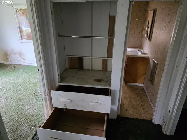 an empty room with closet