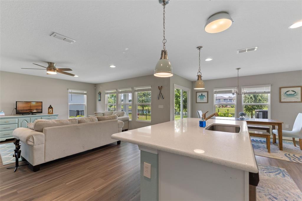 562 Meadow Ridge Drive St. Augustine, FL 32092 - Photo 24 of 61 a living room with furniture and a large window