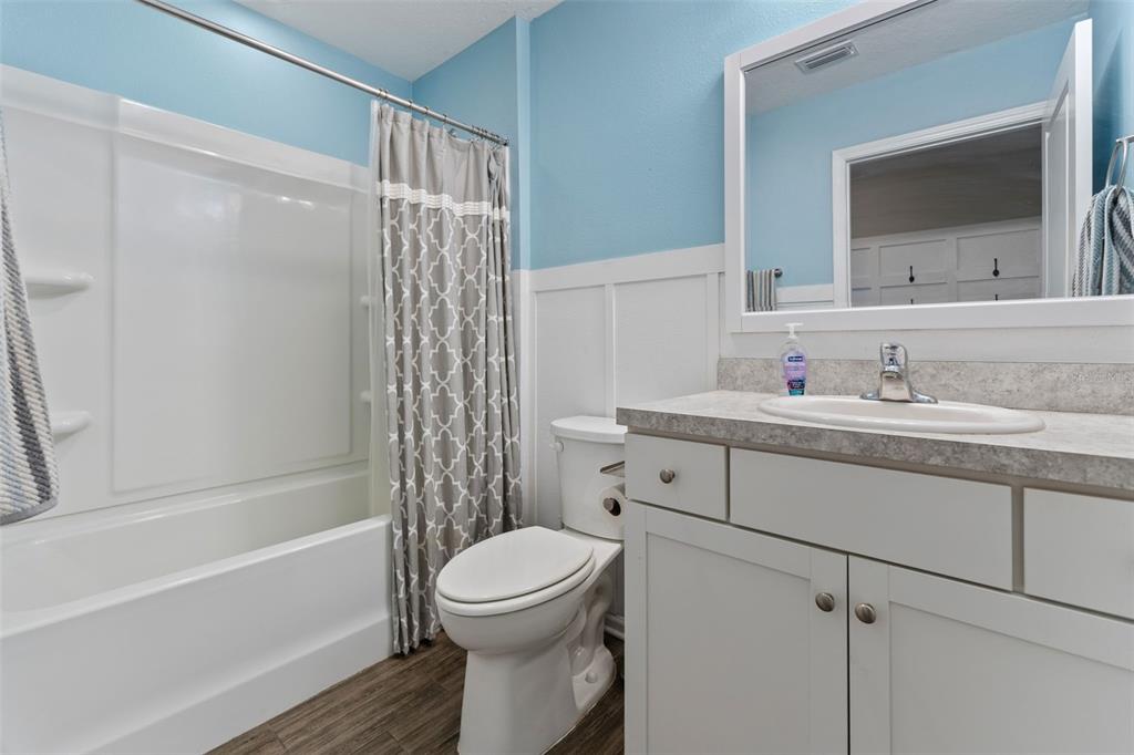 562 Meadow Ridge Drive St. Augustine, FL 32092 - Photo 29 of 61 a bathroom with a sink a toilet and shower