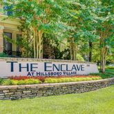 a view of swimming pool with outdoor seating and yard