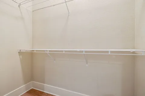 a view of a room with racks on the wall