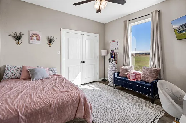 a view of room with furniture and closet