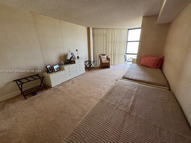 6423 Collins Avenue, Unit 809 Miami Beach, FL 33141 - Photo 14 of 18 a bedroom with furniture and window