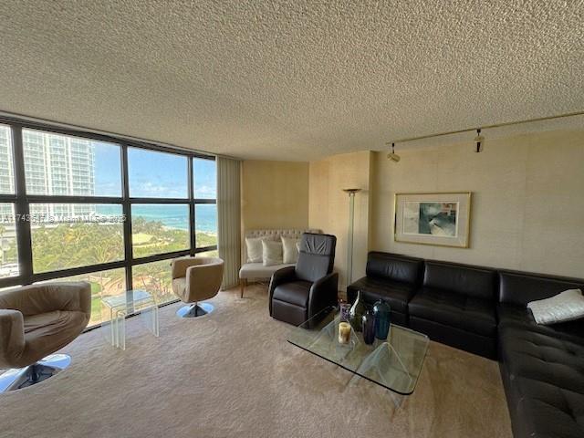 6423 Collins Avenue, Unit 809 Miami Beach, FL 33141 - Photo 2 of 18 a living room with furniture and a window