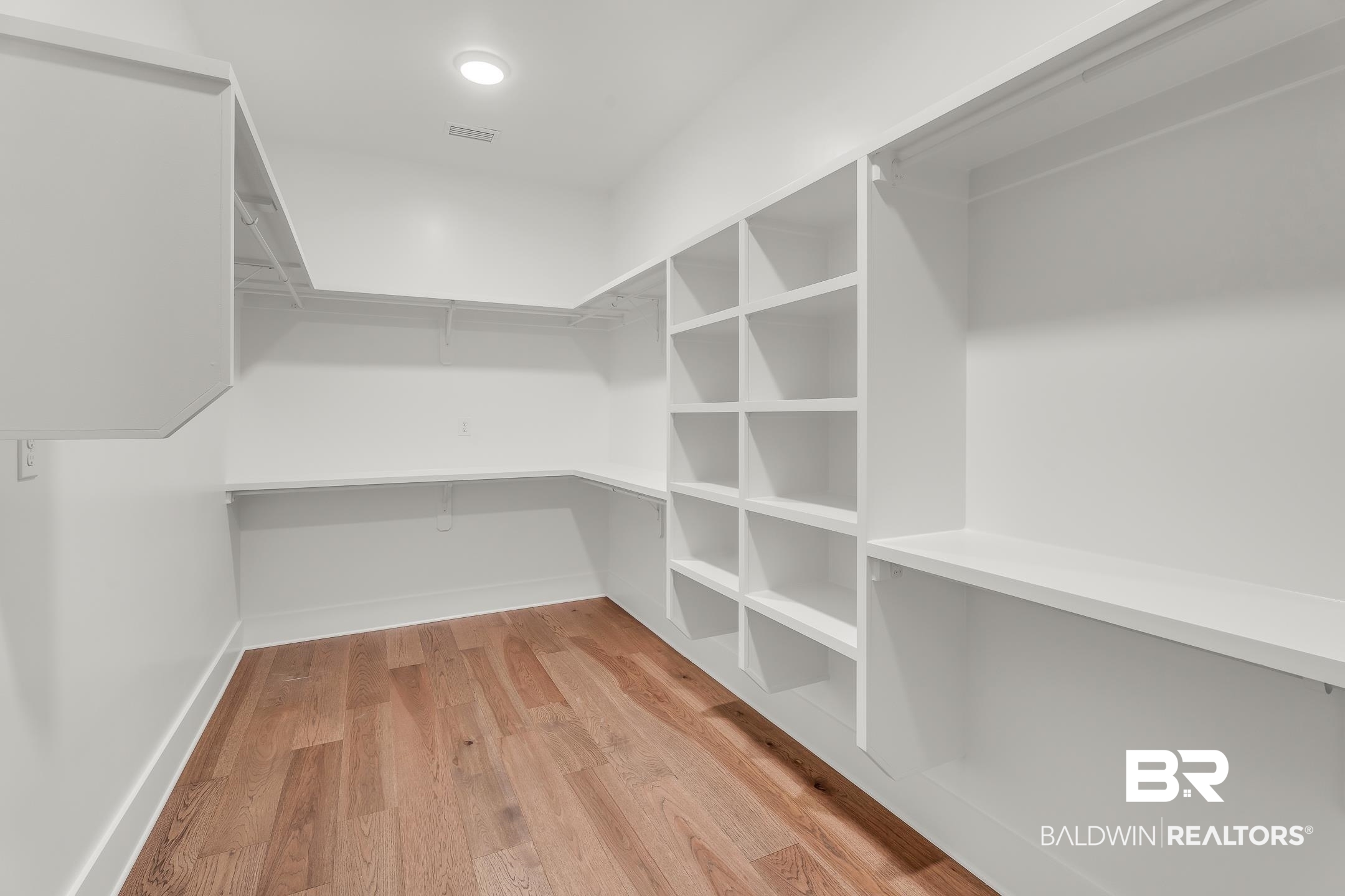 17786 Burwick Loop Fairhope, AL 36532 - Photo 41 of 57 Spacious closet featuring light hardwood / wood-style flooring