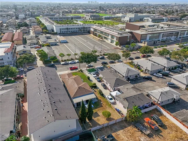 an aerial view of a city with lots of residential buildings
