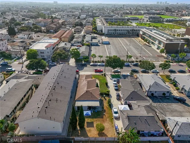 an aerial view of a city with lots of residential buildings