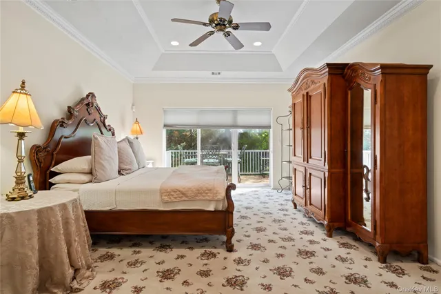 a bedroom with bed and a window