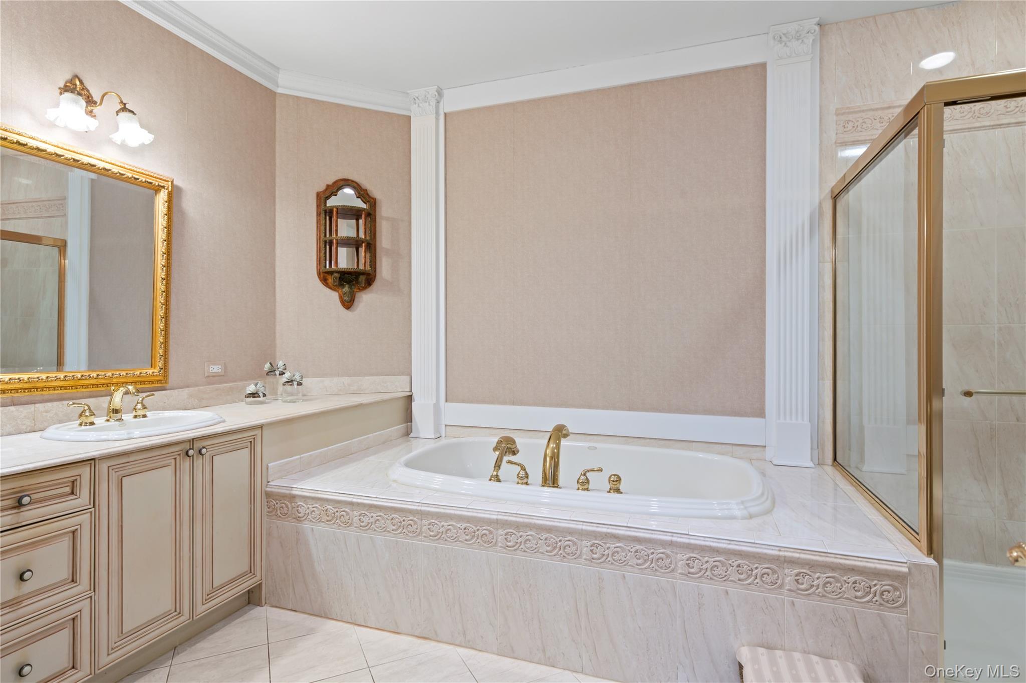 30 Sagamore Drive Plainview, NY 11803 - Photo 18 of 33 a bathroom with a bathtub and a sink