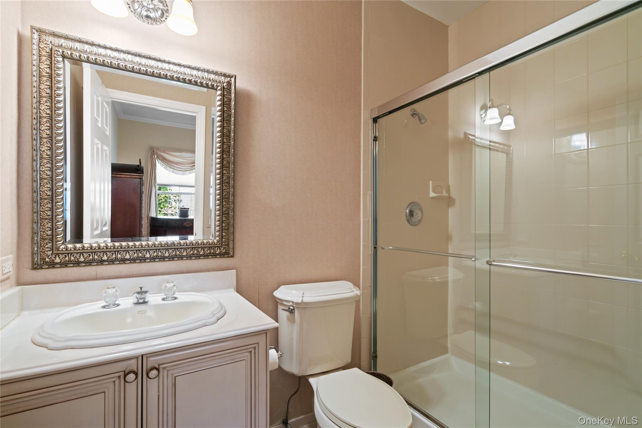 30 Sagamore Drive Plainview, NY 11803 - Photo 23 of 33 a bathroom with a sink toilet and shower