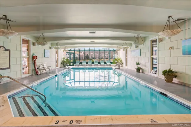 a view of a living room and balcony