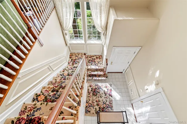 wooden floor with white walls