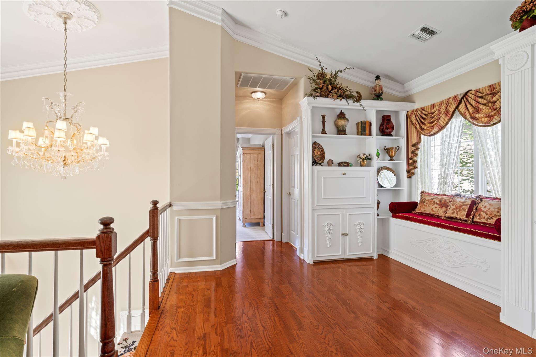 30 Sagamore Drive Plainview, NY 11803 - Photo 6 of 33 a view of a hallway with wooden floor and dining room