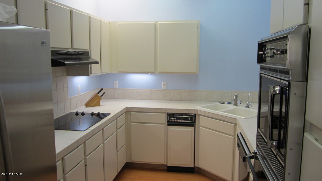 7272 East Gainey Ranch Road, Unit 1 Scottsdale, AZ 85258 - Photo 2 of 6 Kitchen with Dinette Area