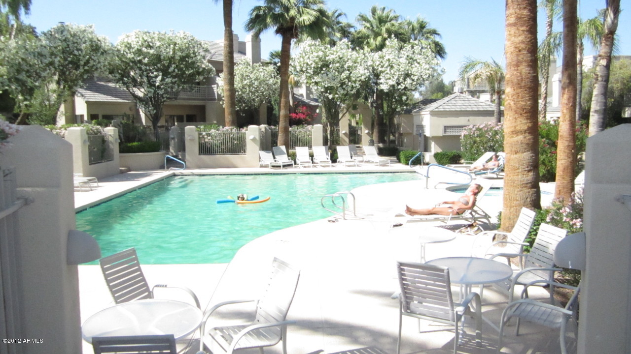 7272 East Gainey Ranch Road, Unit 1 Scottsdale, AZ 85258 - Photo 4 of 6 Pool area with Spa