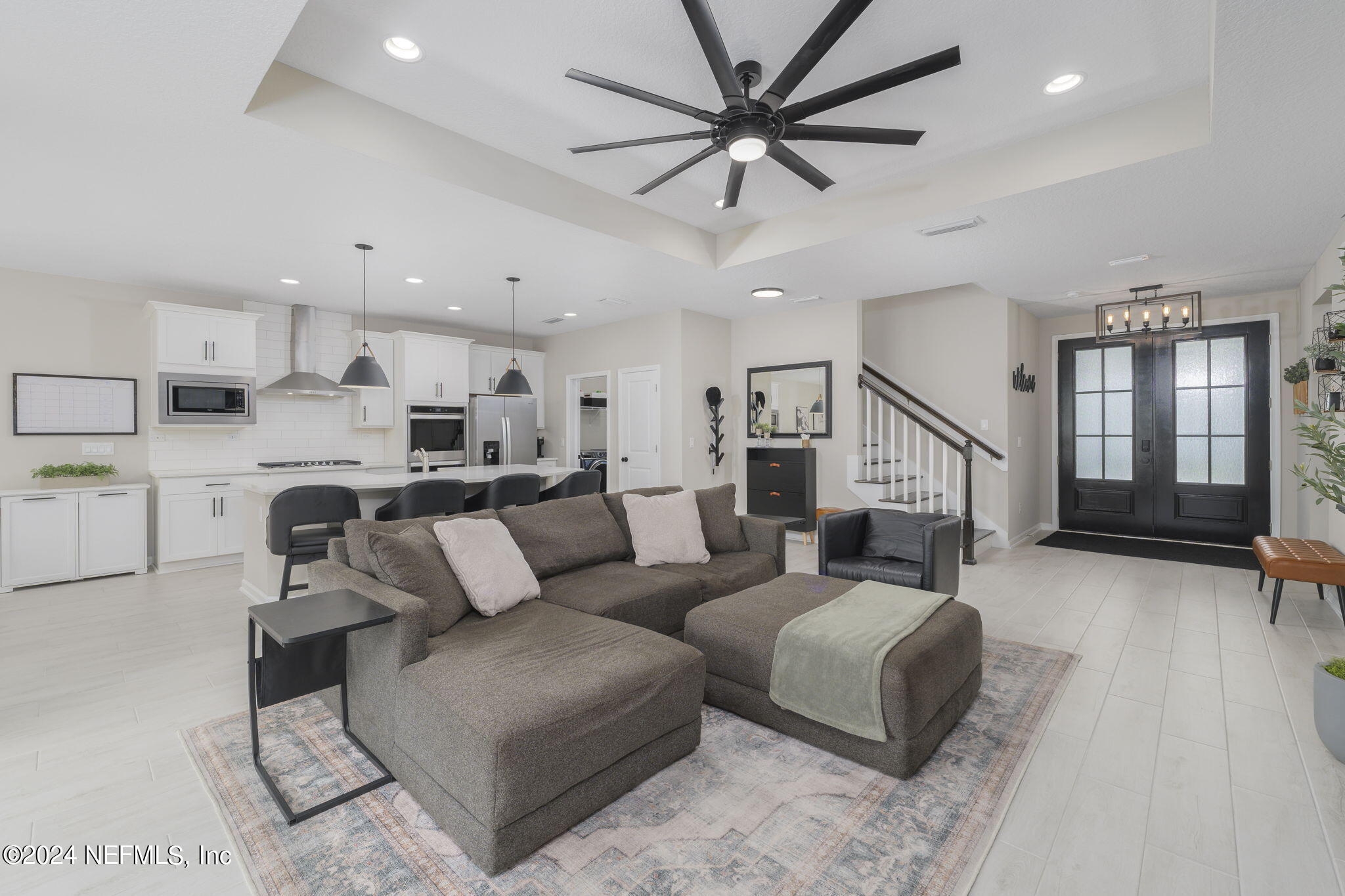 33 Pinzon Pl Street St. Augustine, FL 32095 - Photo 12 of 41 a living room with furniture and a view of kitchen