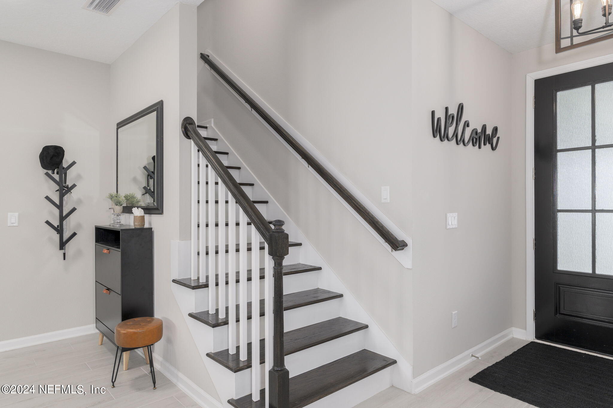33 Pinzon Pl Street St. Augustine, FL 32095 - Photo 13 of 41 a view of entryway with wooden floor and stairs