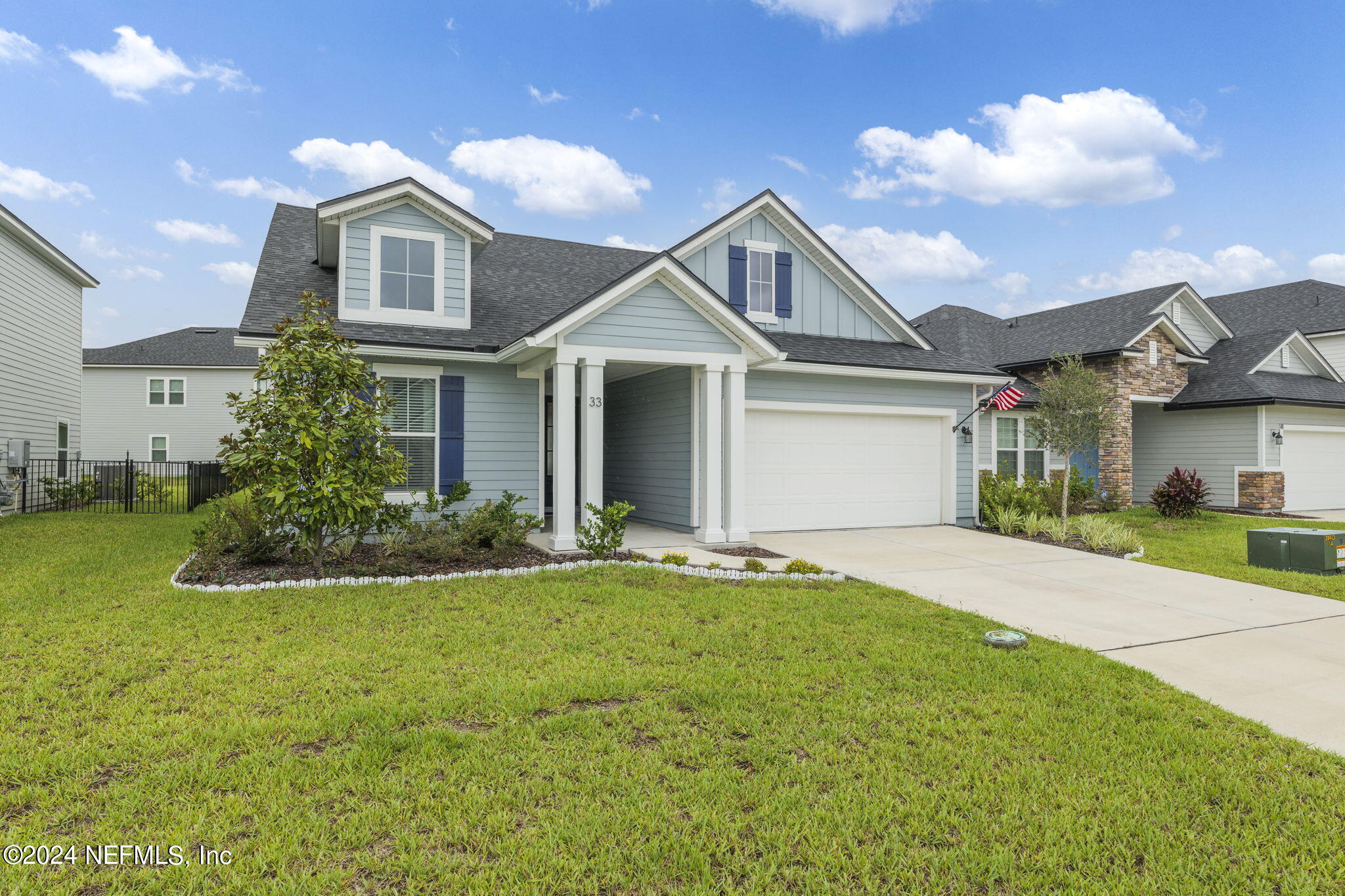 33 Pinzon Pl Street St. Augustine, FL 32095 - Photo 2 of 41 a front view of a house with a yard