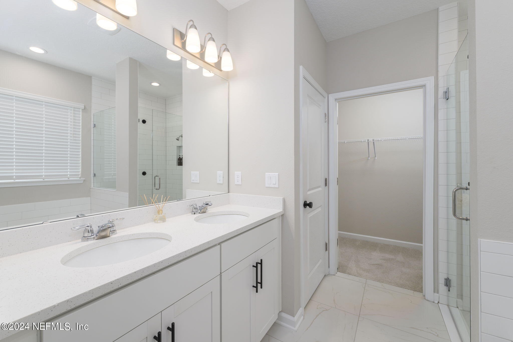 33 Pinzon Pl Street St. Augustine, FL 32095 - Photo 22 of 41 a bathroom with a sink double vanity granite tub and shower
