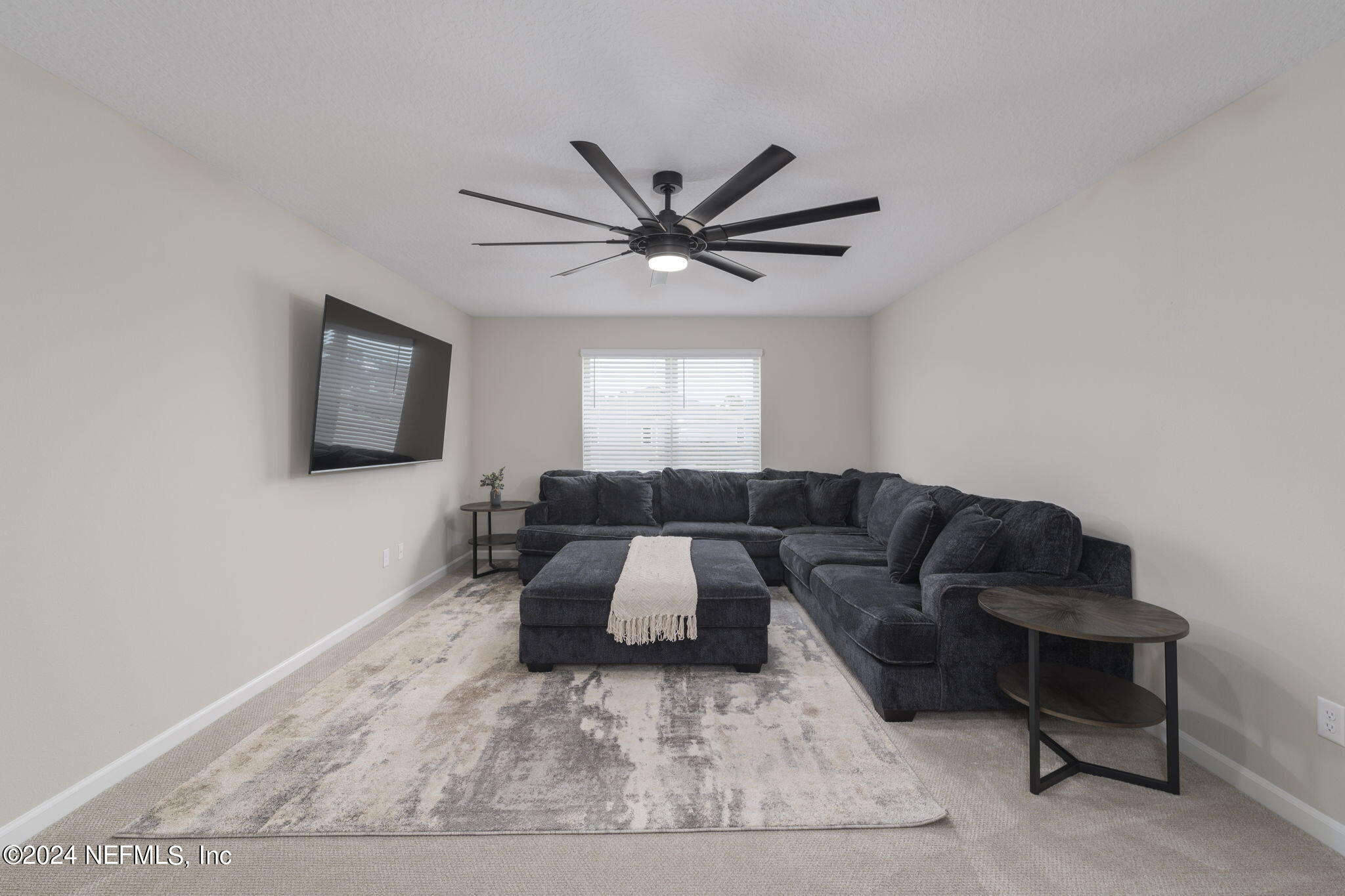 33 Pinzon Pl Street St. Augustine, FL 32095 - Photo 27 of 41 a living room with furniture and a large window