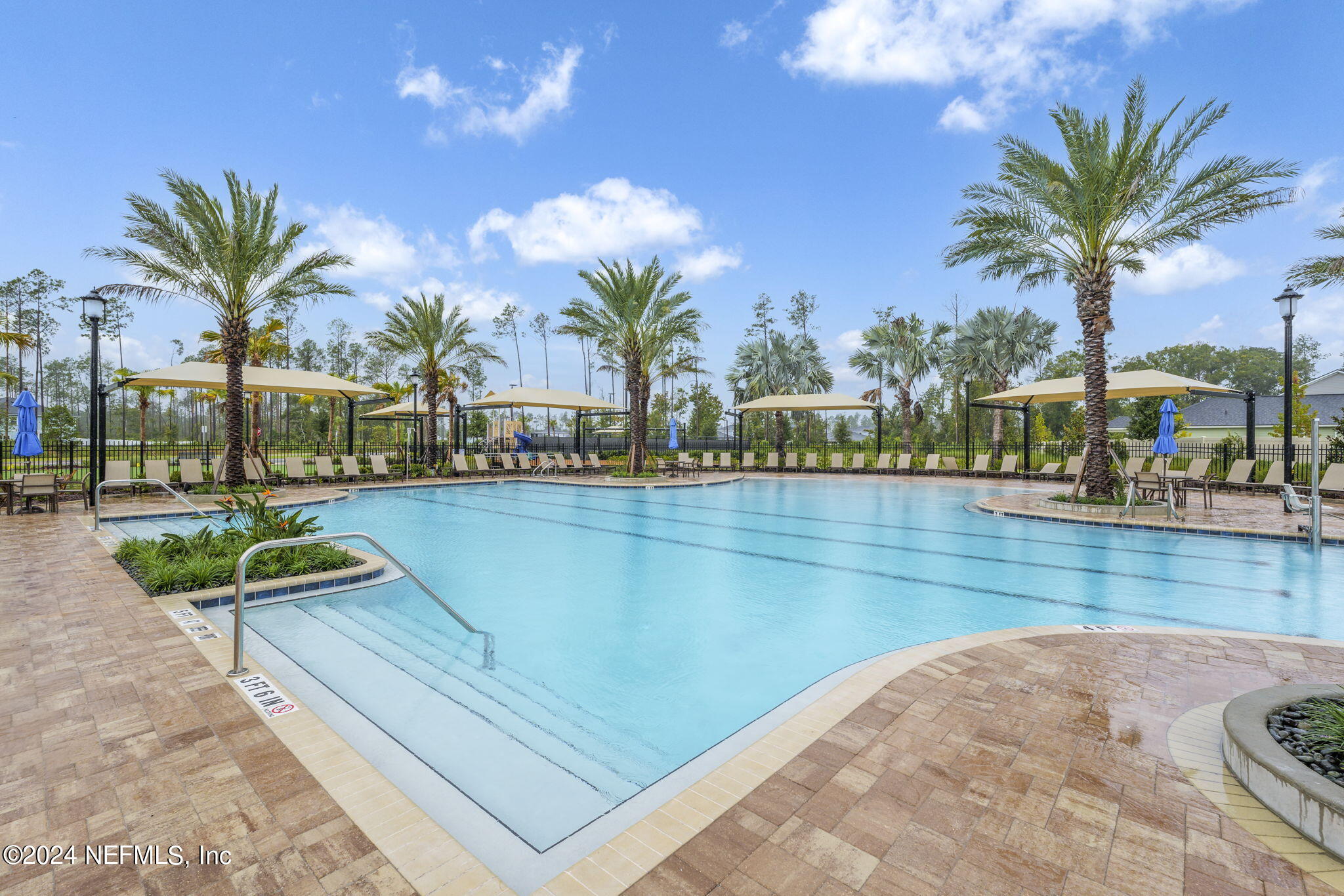 33 Pinzon Pl Street St. Augustine, FL 32095 - Photo 34 of 41 a view of swimming pool with outdoor seating and palm trees