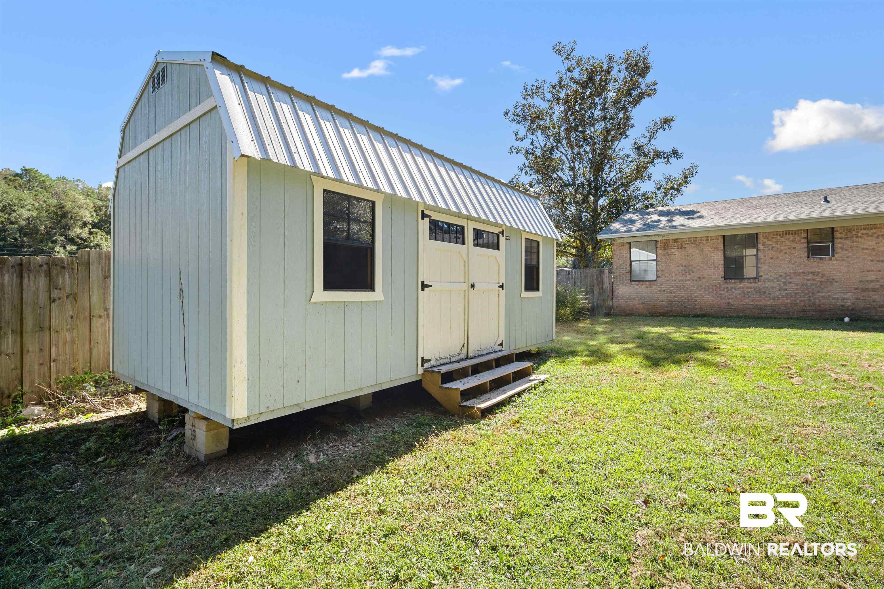 12910 Del Rio Street Grand Bay, AL 36541 - Photo 26 of 26 View of outbuilding with a fenced backyard