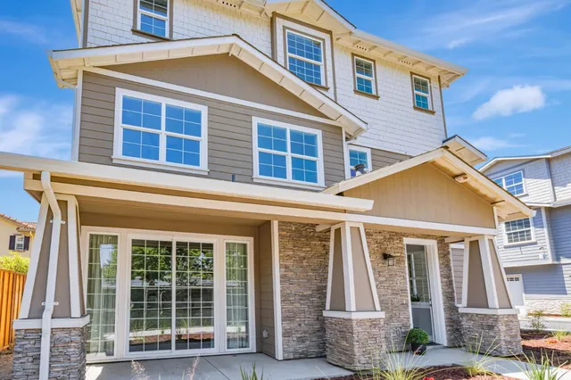 a view of a house with a windows and wooden floor