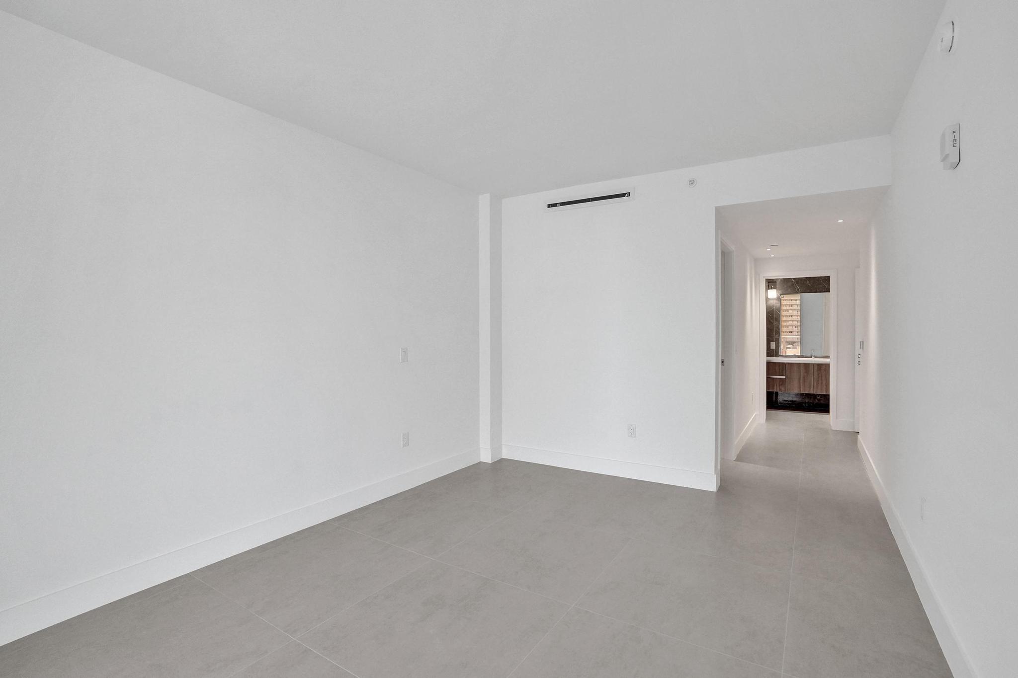 407 North Riverside Drive, Unit 602 Pompano Beach, FL 33062 - Photo 23 of 83 wooden floor in an empty room
