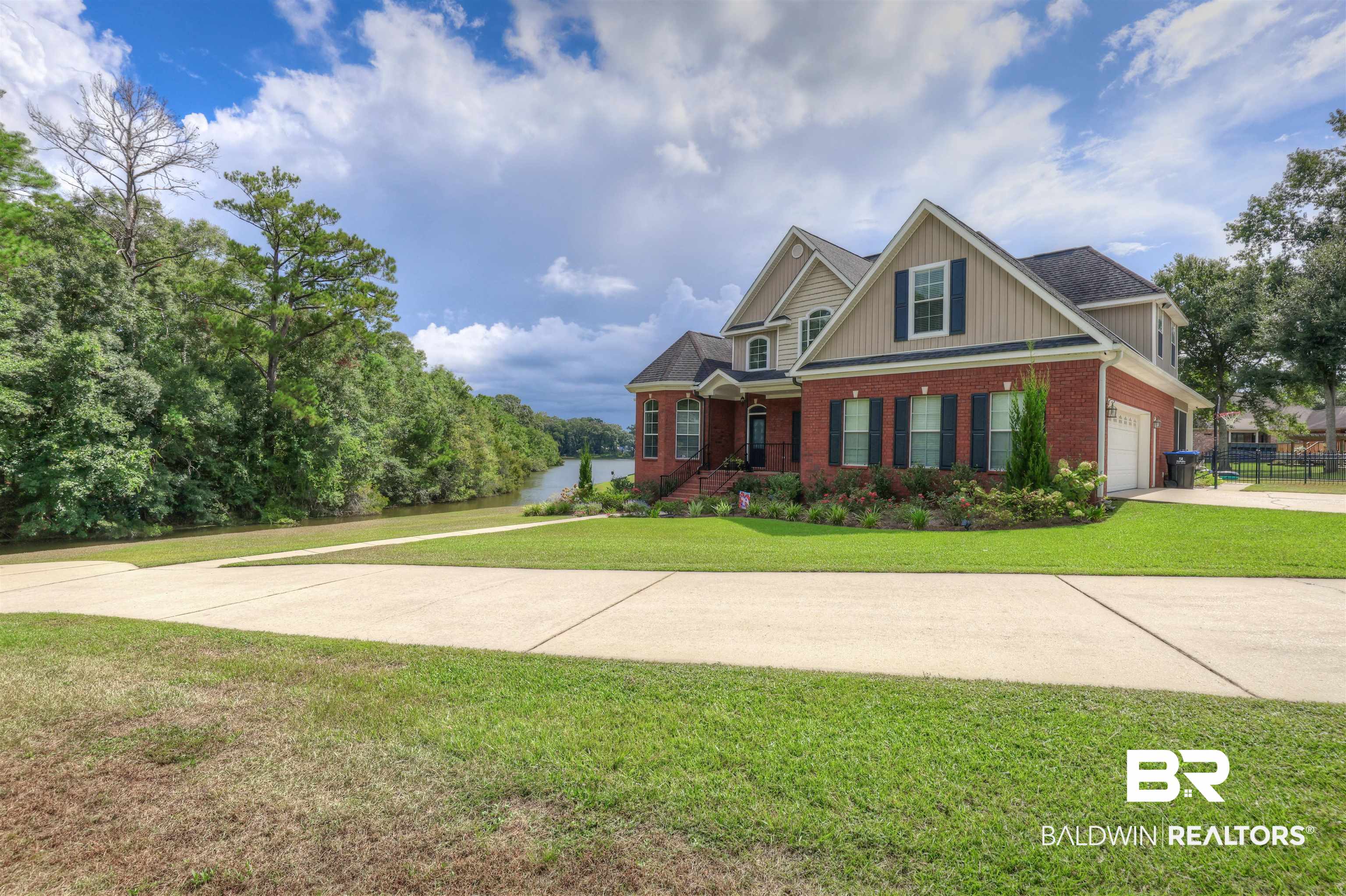 5565 Dawes Lane Theodore, AL 36582 - Photo 38 of 38 Craftsman-style home with a front lawn