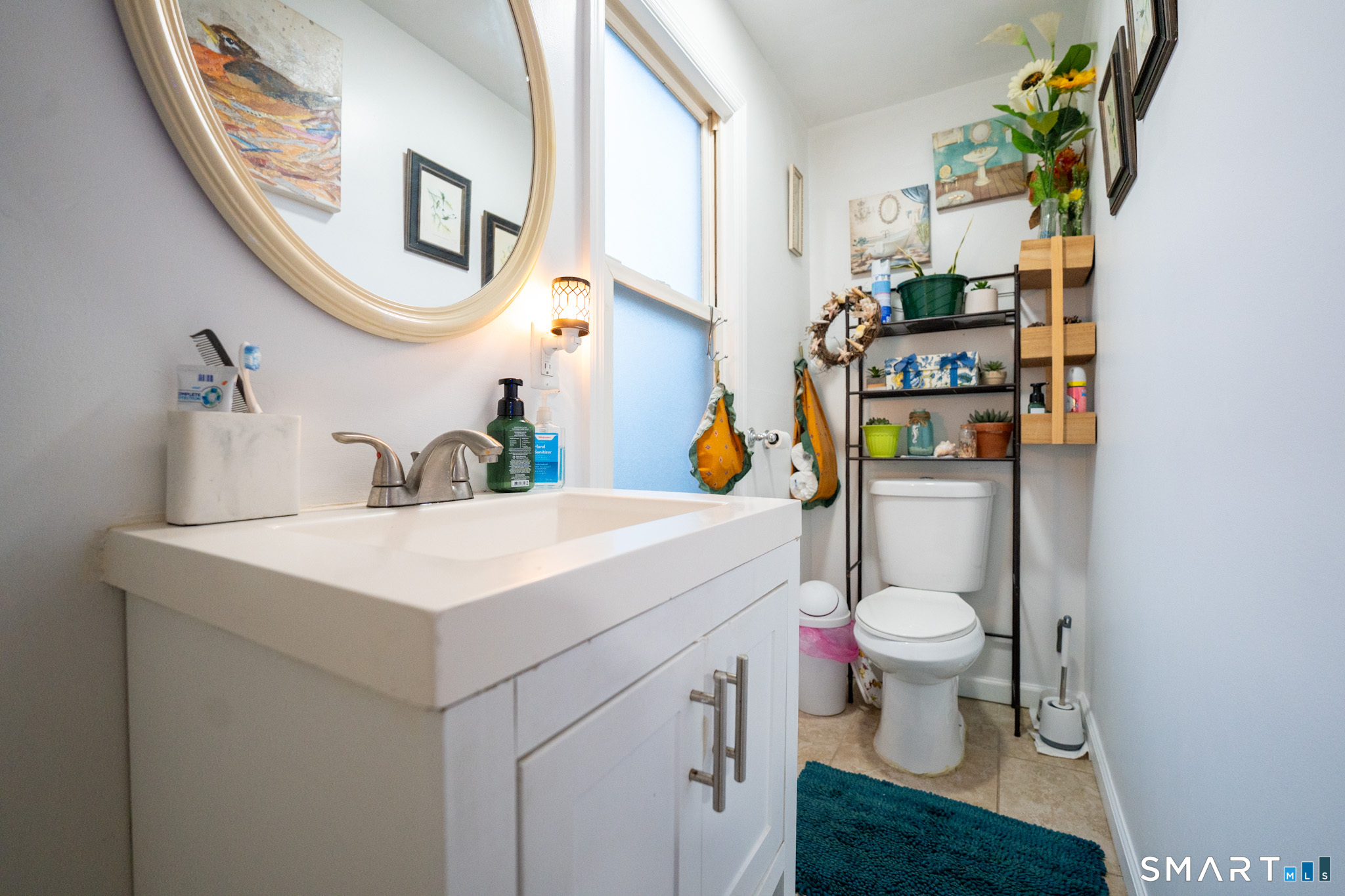 26 Mountainville Road Danbury, CT 06810 - Photo 12 of 13 a bathroom with a sink toilet and mirror
