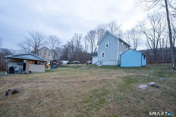 a house with trees in front of it