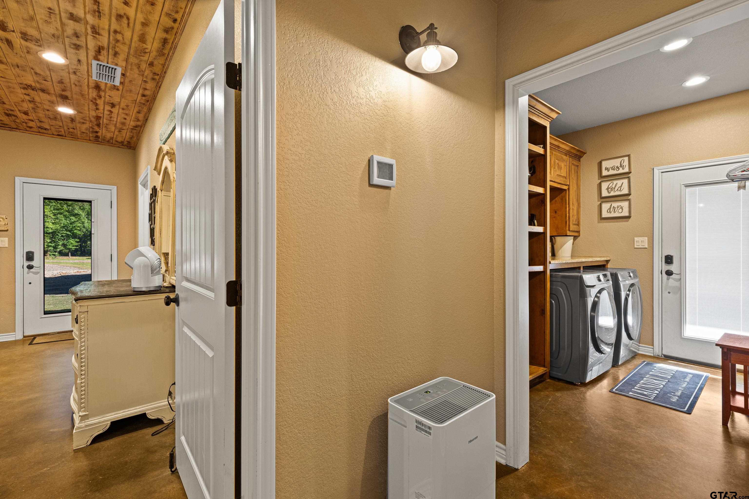 10586 Petunia Road Ore City, TX 75683 - Photo 23 of 45 a view of entryway with livingroom and furniture