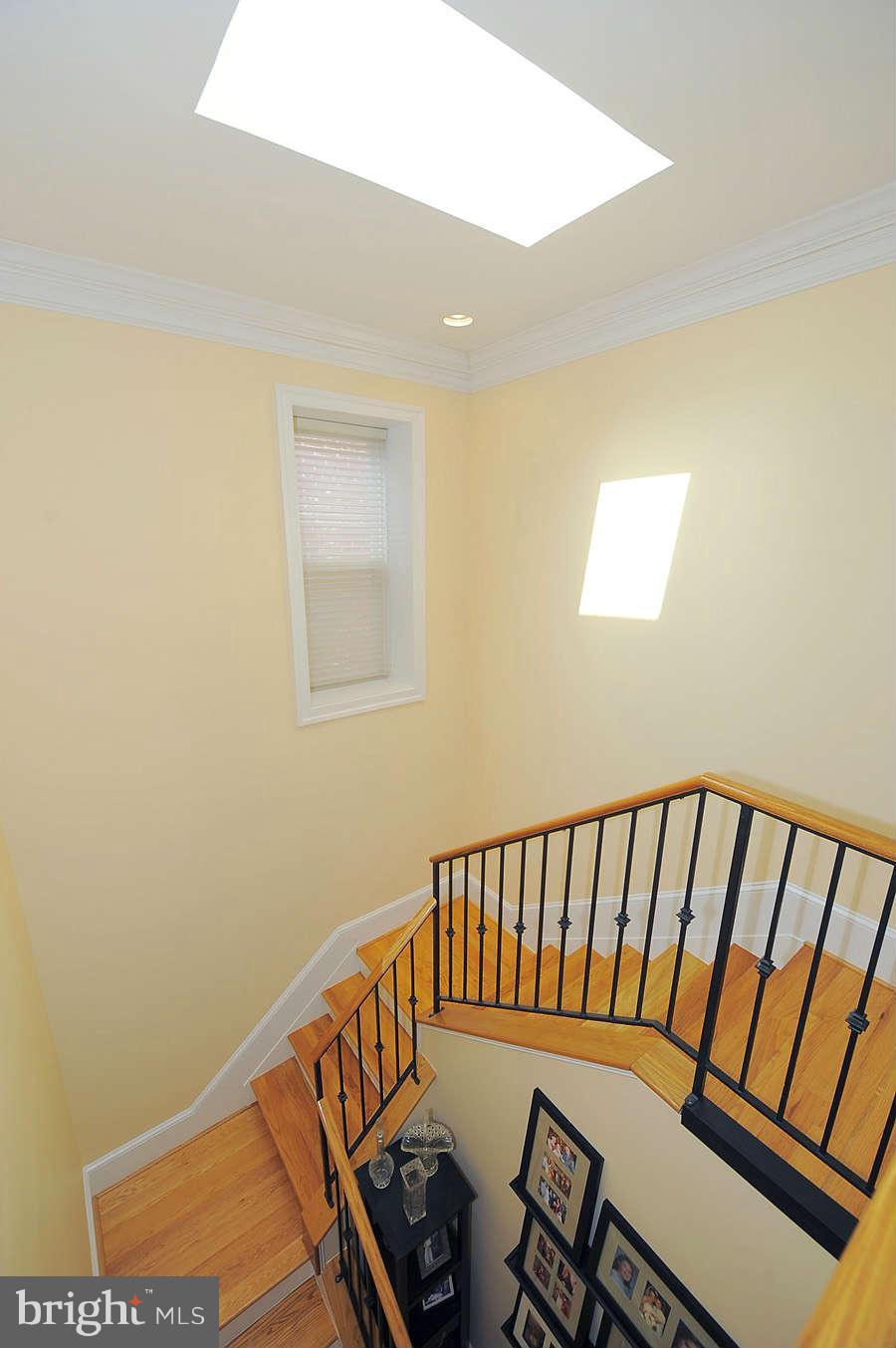 629 4th Street Northeast, Unit 3 Washington, DC 20002 - Photo 12 of 30 a view of a hallway with wooden floor