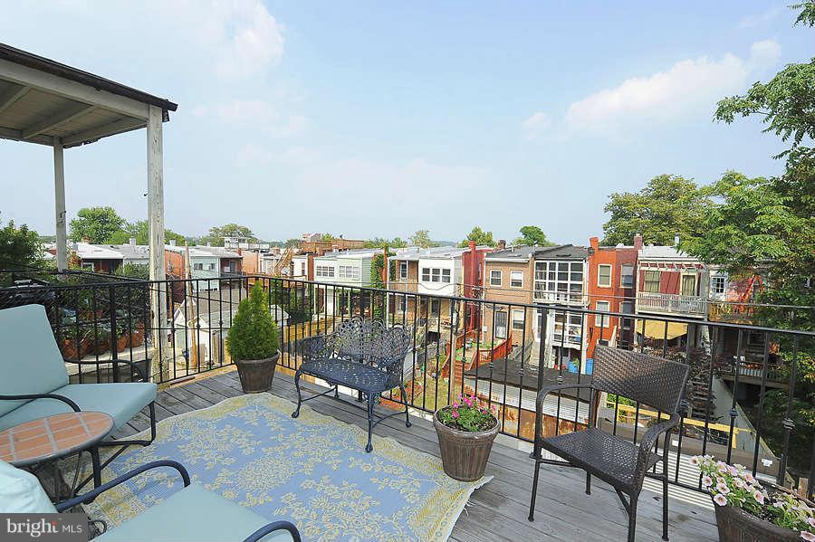 629 4th Street Northeast, Unit 3 Washington, DC 20002 - Photo 18 of 30 a view of a chairs and table in patio