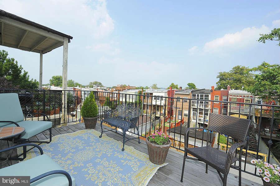 629 4th Street Northeast, Unit 3 Washington, DC 20002 - Photo 19 of 30 a view of a chairs and table in patio