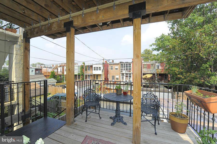 629 4th Street Northeast, Unit 3 Washington, DC 20002 - Photo 27 of 30 a view of balcony with couch