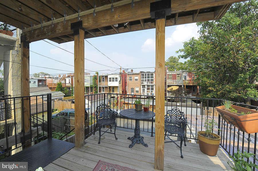 629 4th Street Northeast, Unit 3 Washington, DC 20002 - Photo 28 of 30 a view of a balcony with chairs
