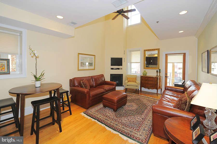 629 4th Street Northeast, Unit 3 Washington, DC 20002 - Photo 7 of 30 a living room with furniture and a table