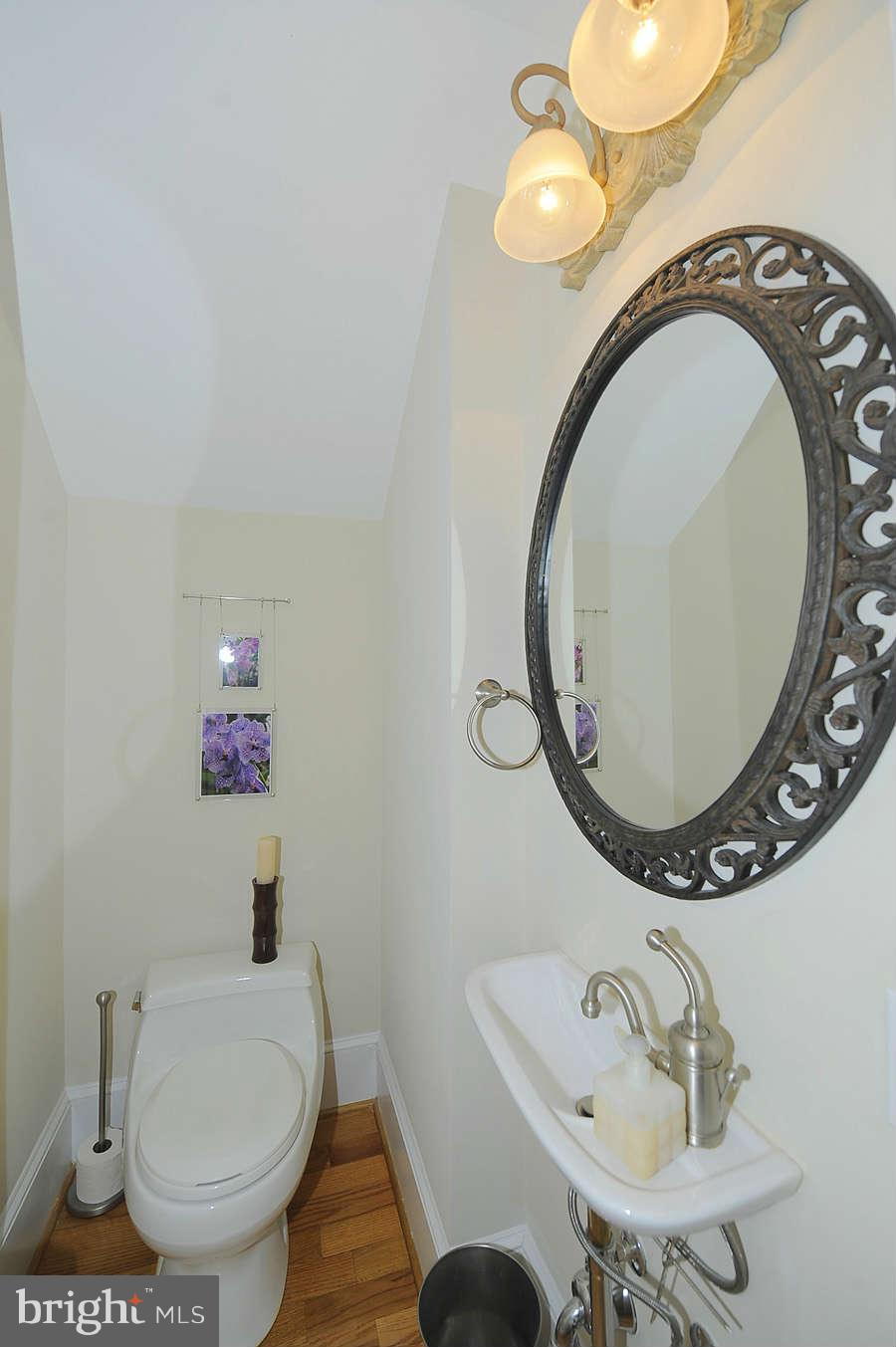 629 4th Street Northeast, Unit 3 Washington, DC 20002 - Photo 10 of 30 a bathroom with a toilet and a sink