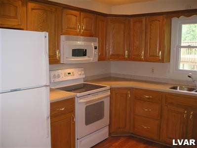 475 Nolf Road Nazareth, PA 18064 - Photo 3 of 19 a kitchen with a sink cabinets and appliances